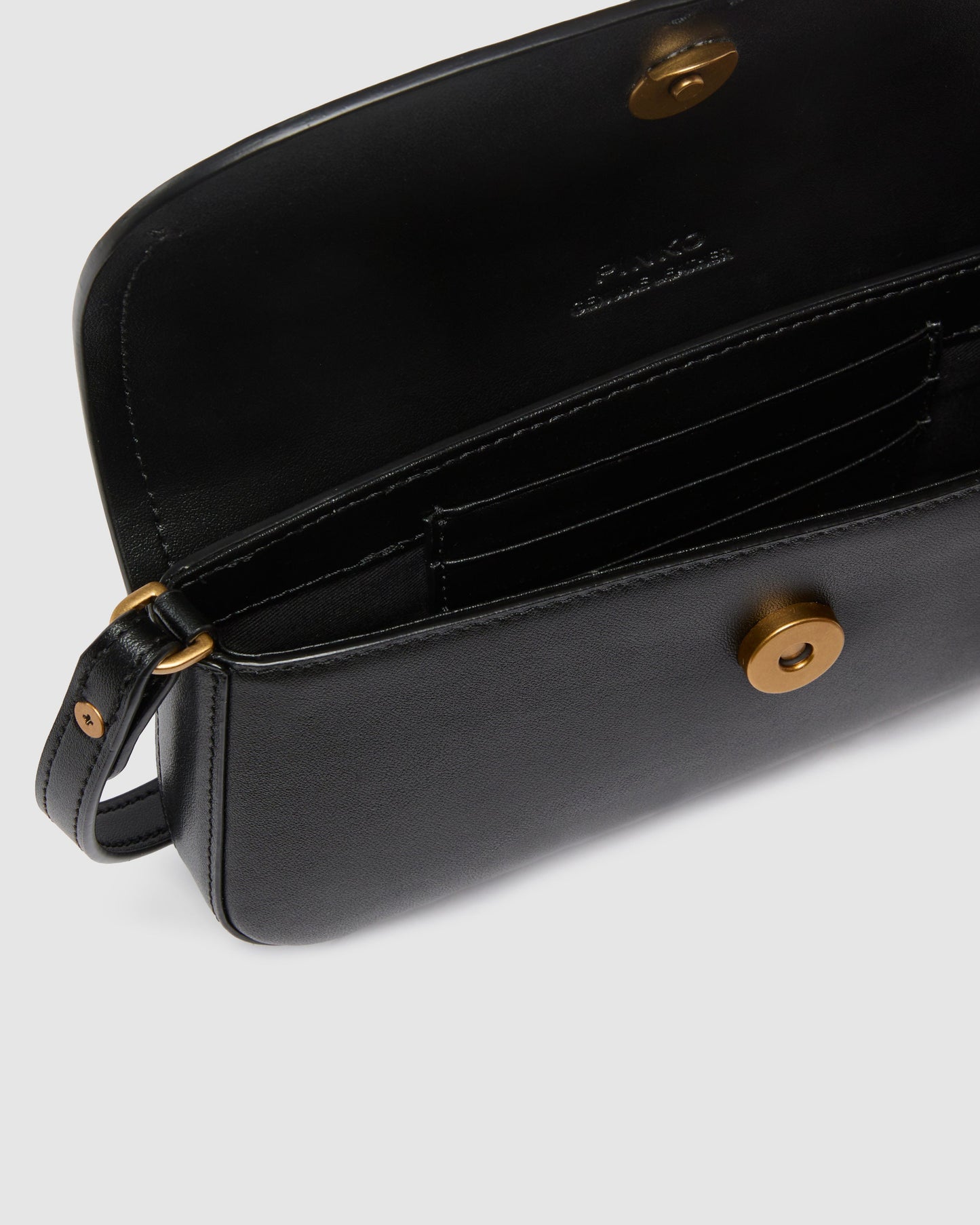 Saddle Flat medium shoulder bag in leather