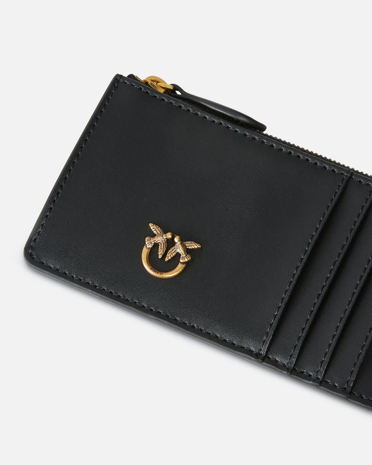 Zipped chevron-patterned card holder
