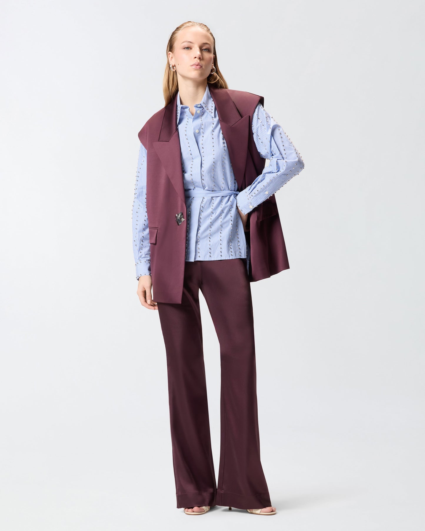 Striped shirt with jewel embellishment