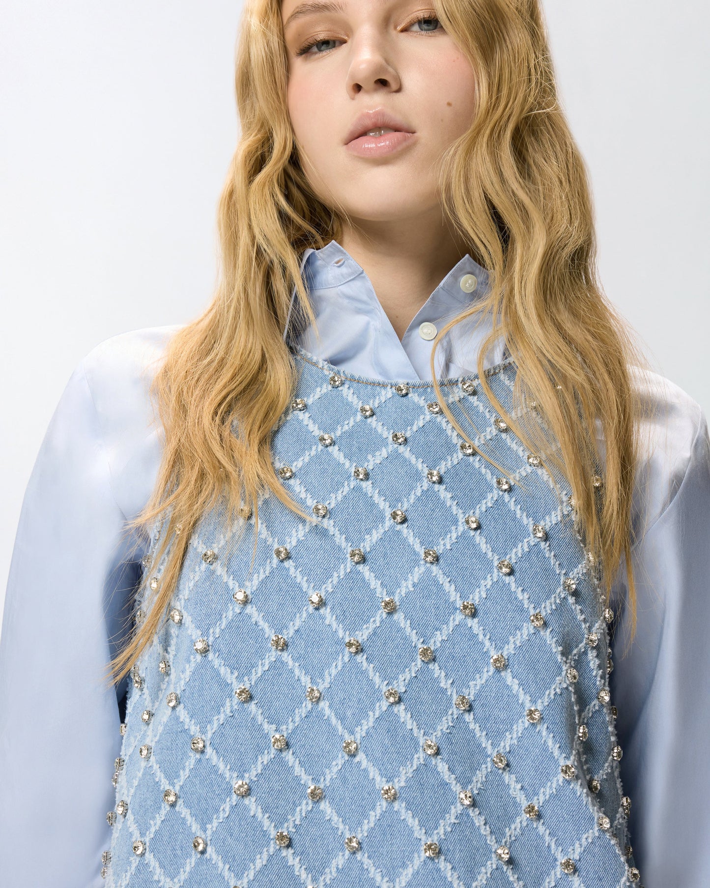 Denim mini dress with diamond and rhinestone motif