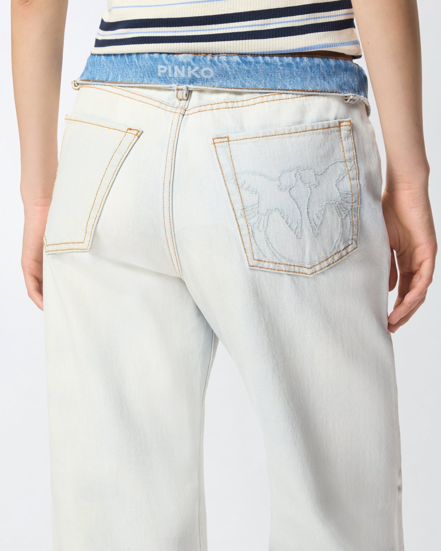 Jeans with contrasting fold-down waist