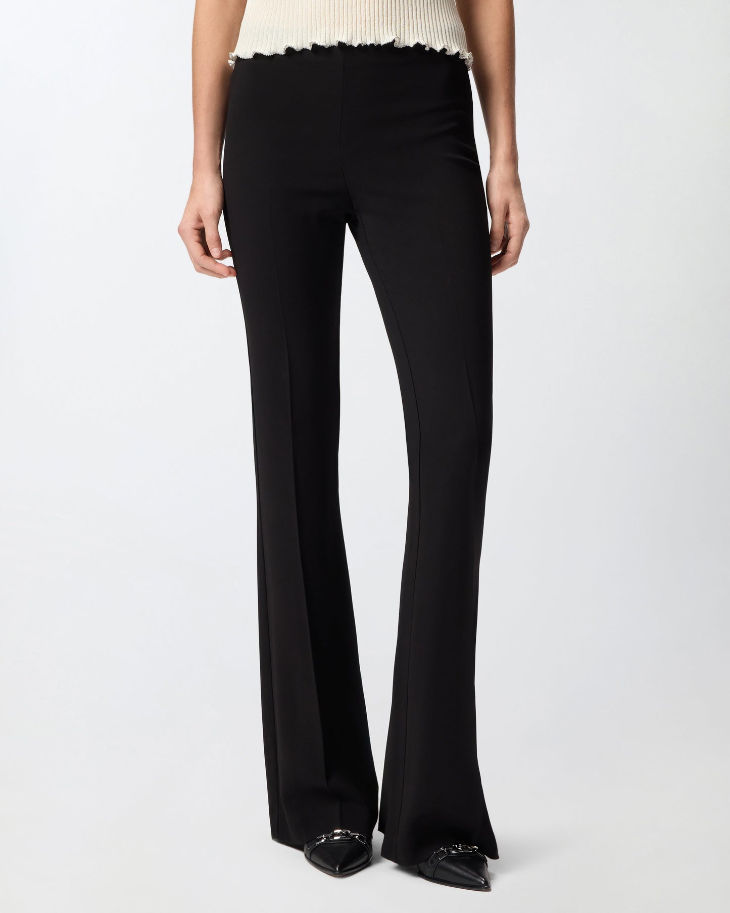 Flared trousers with pressed pleat detail