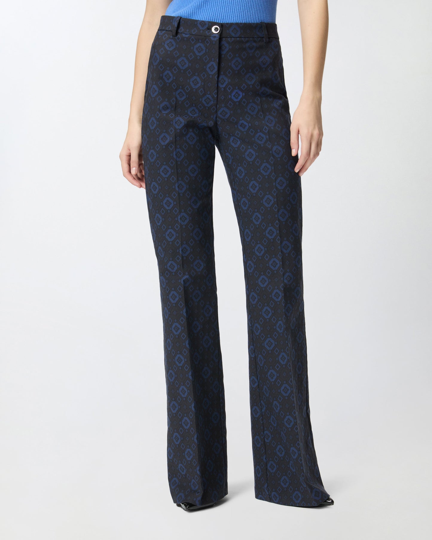 Trousers with a geometric and floral motif