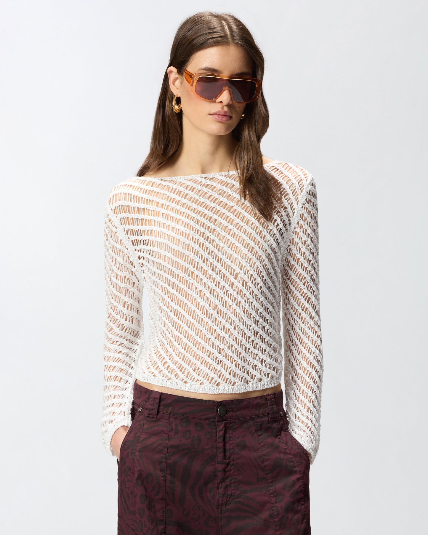 Crochet effect sweater with sequins