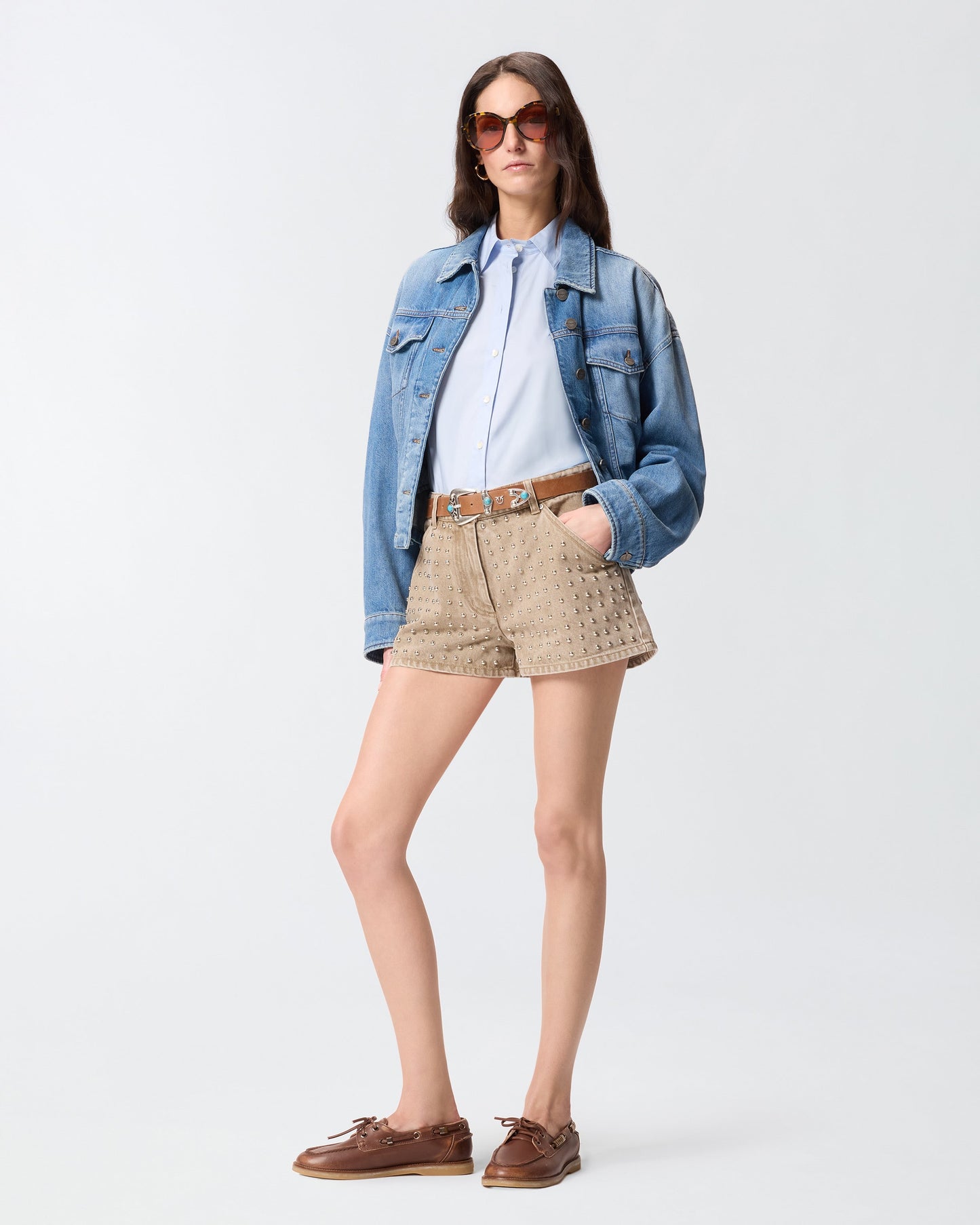 Brown denim shorts with studs