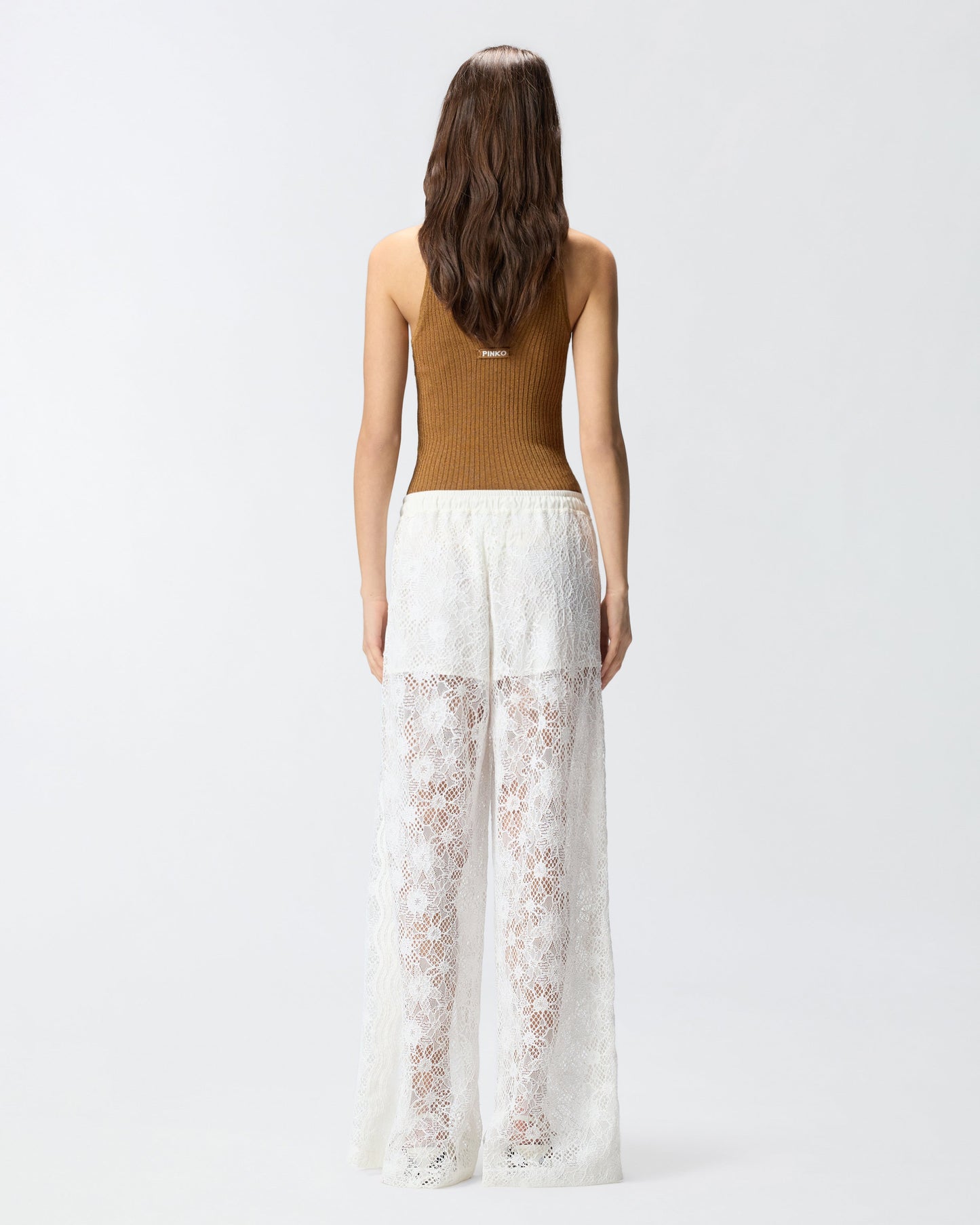 Trousers in floral embroidered lace