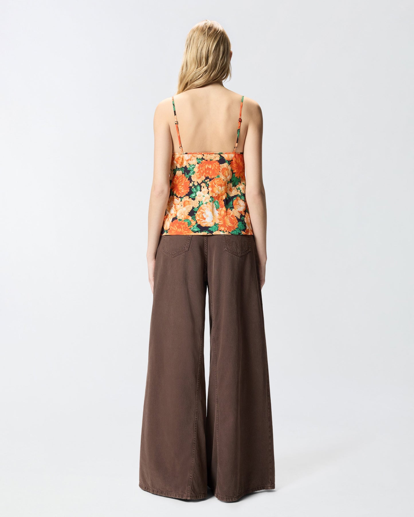 Sleeveless top with fringing and floral print