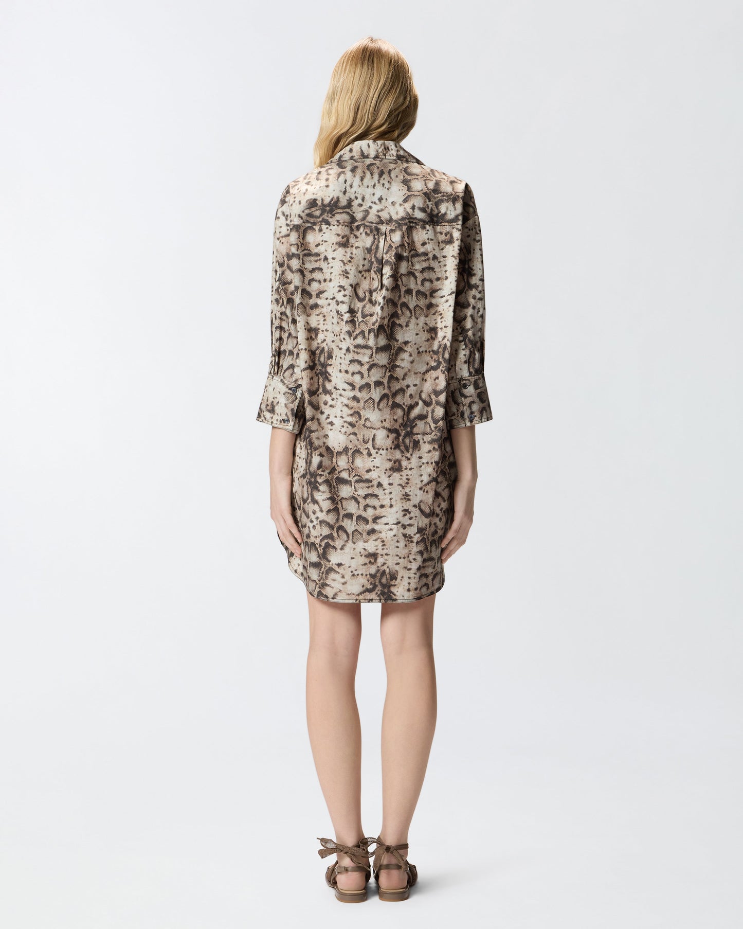 Mini dress with snake print and neckline ribbons