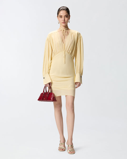 Mini dress with long sleeves and draping