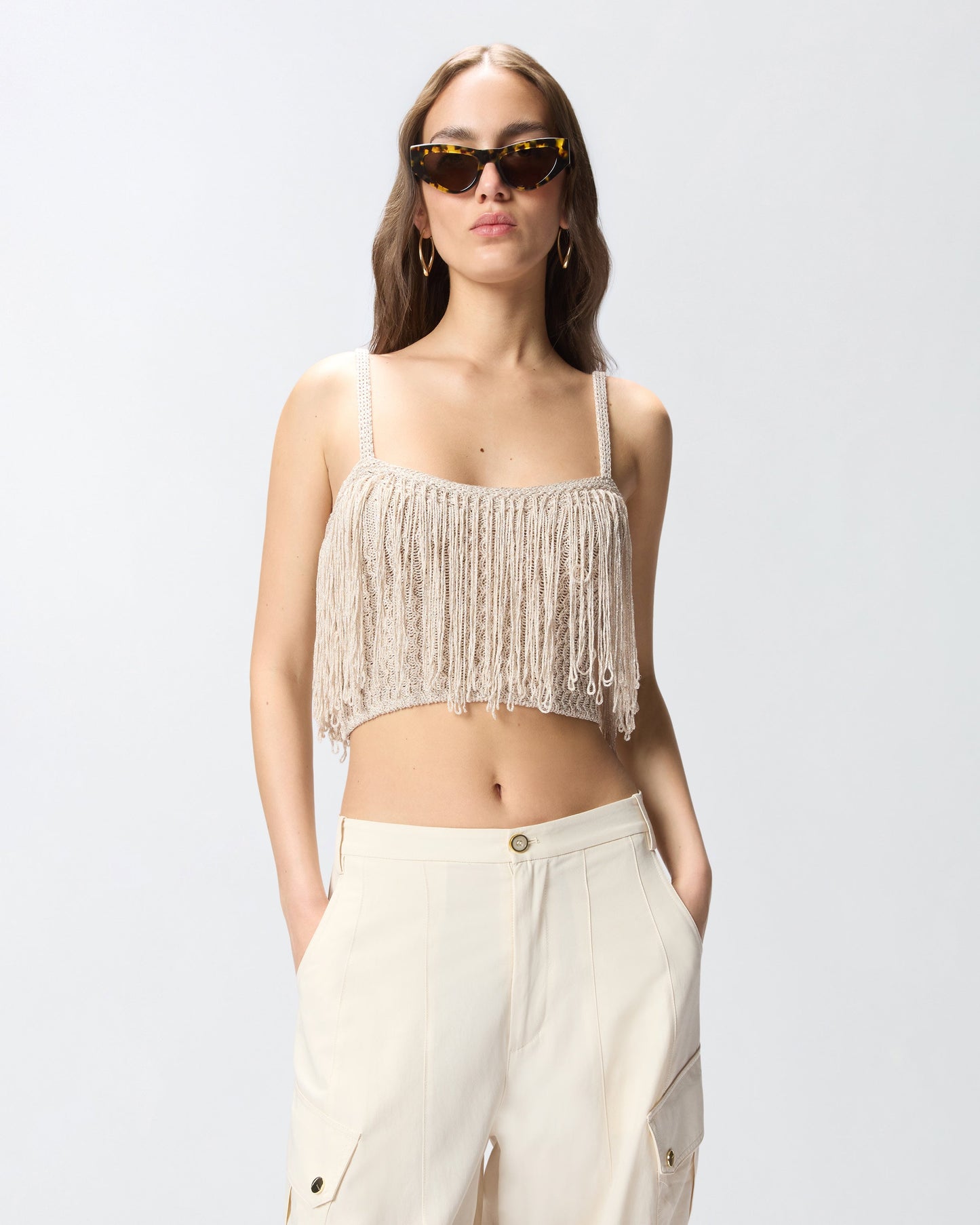 Crop top in knit with fringes