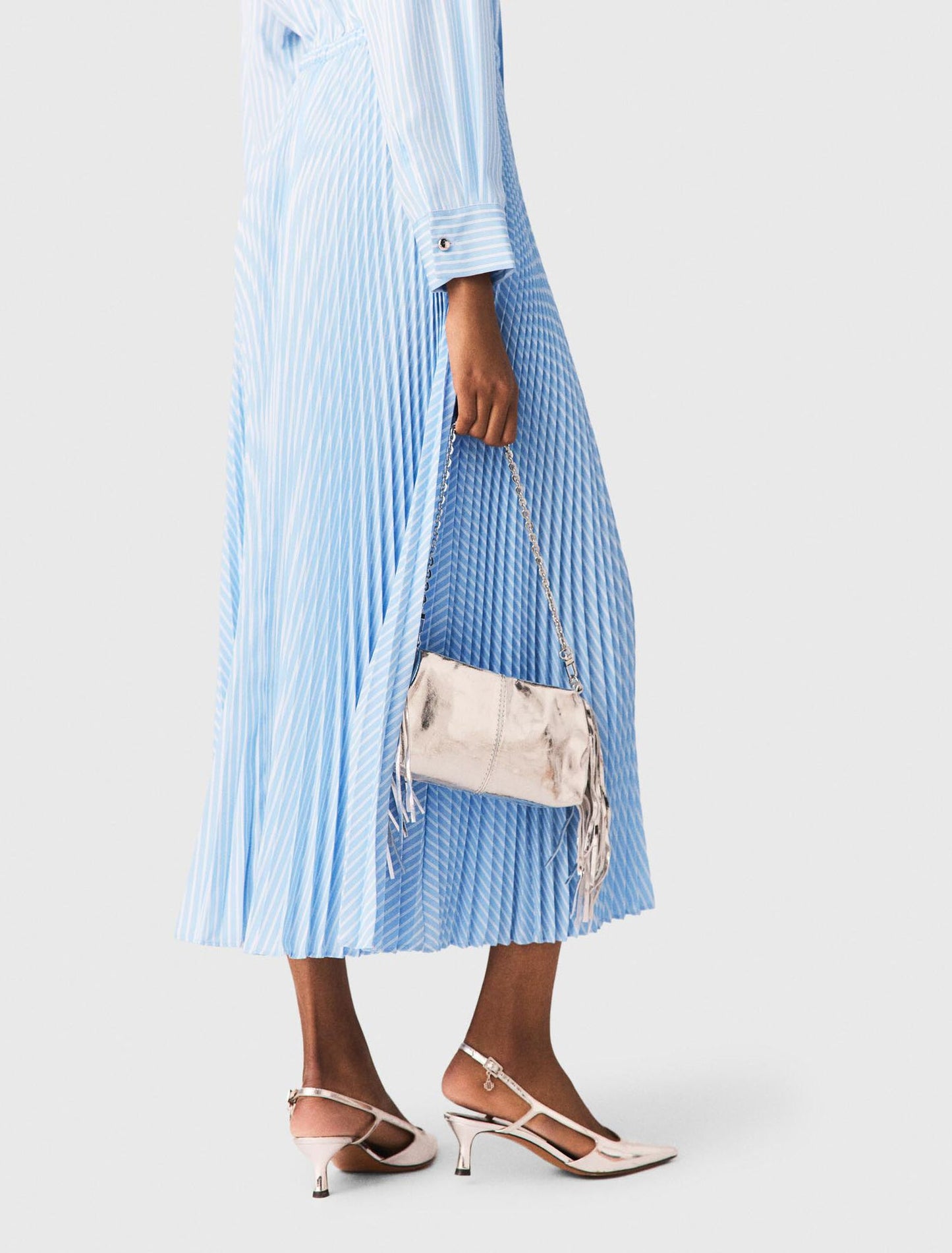 Long pleated dress with eyelets