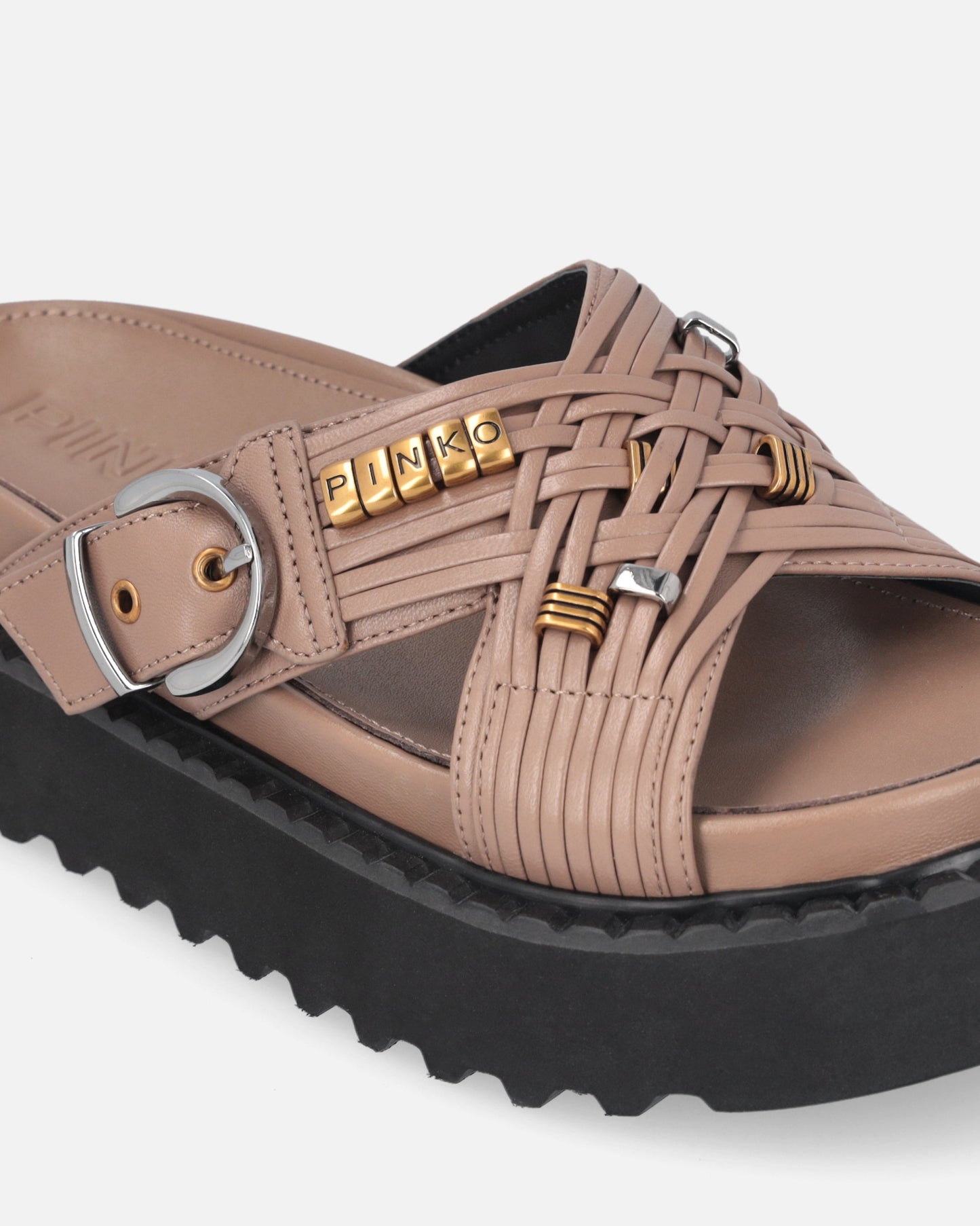 Woven nappa leather slip-on sandals with metallic rings