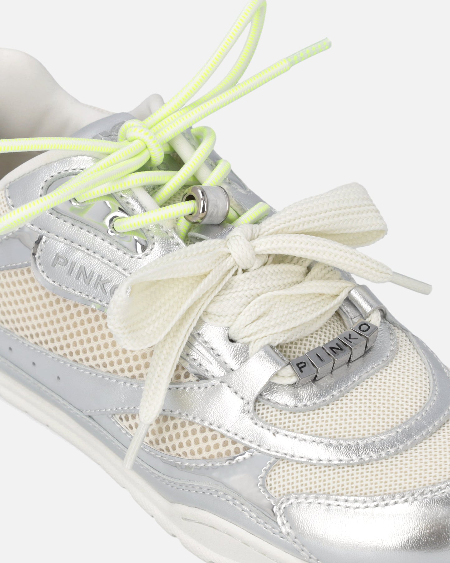 Laminated sneakers with double laces and jewel details
